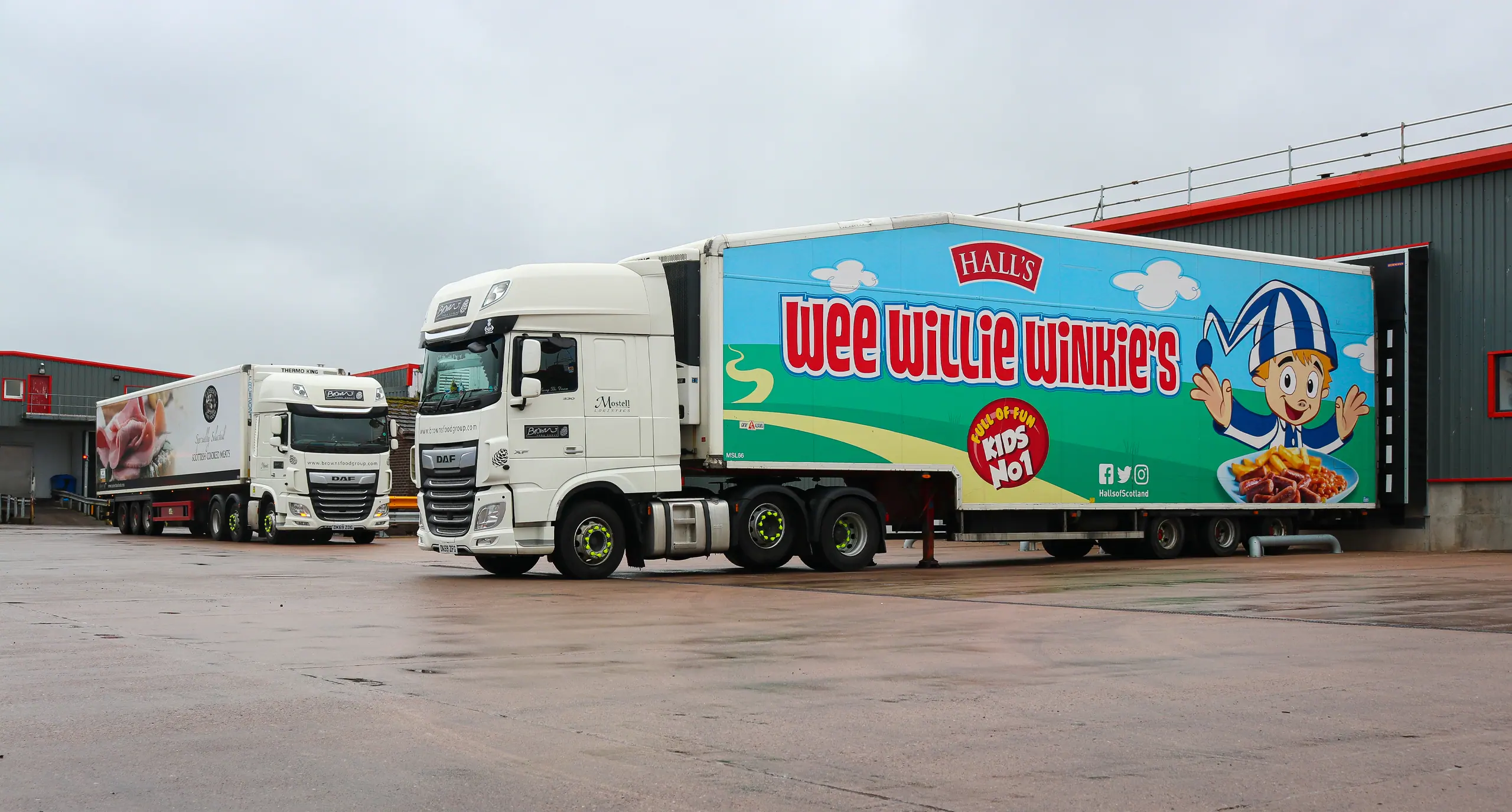A refrigerated lorry in Wee Willie Winkie livery at the Kelloholm site